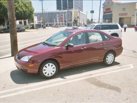 Maroon ford focus #9